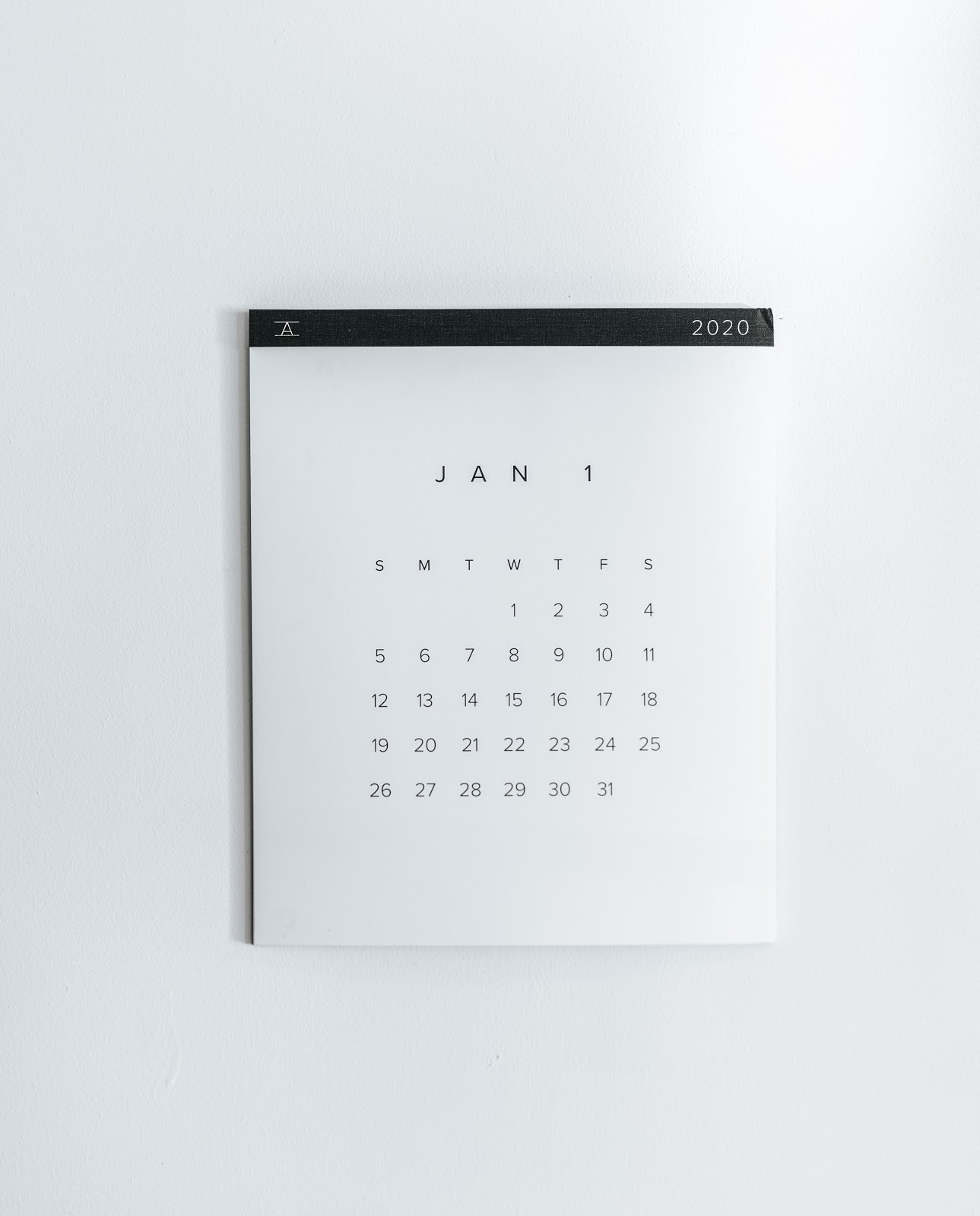 A simple wall calendar with January 2020 showing.