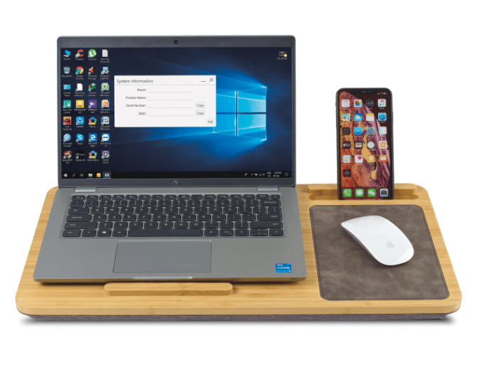 A laptop desk with a laptop, a phone and a mouse on top.