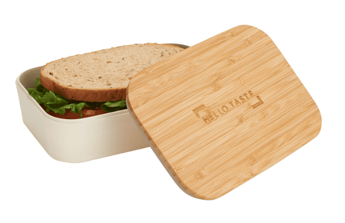 A lunch box with a sandwich inside.
