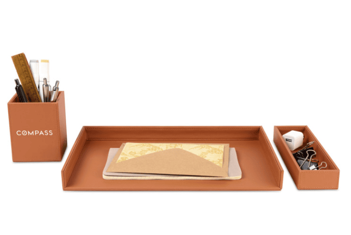 A brown document tray, pencil cup, and accessory tray.