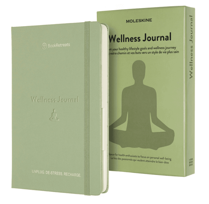  Two green notebooks.