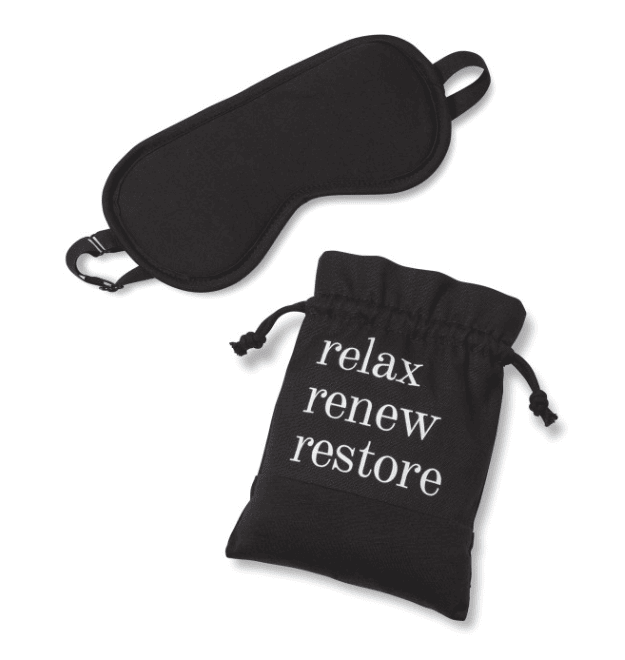 A black eye mask and a pouch.