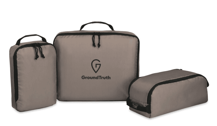 Three brown packing cubes.