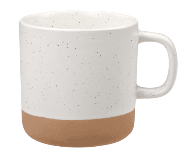 A white mug with a brown bottom.