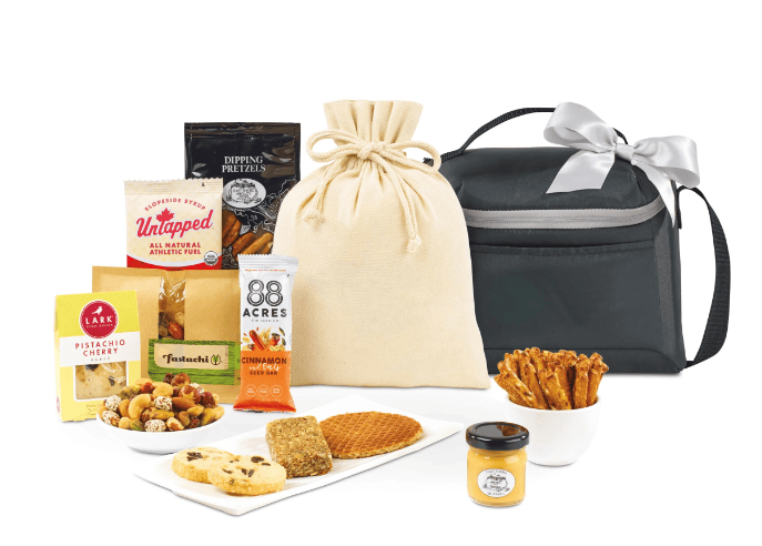 A cooler bag, a pouch, and lots of sweet and salty treats.