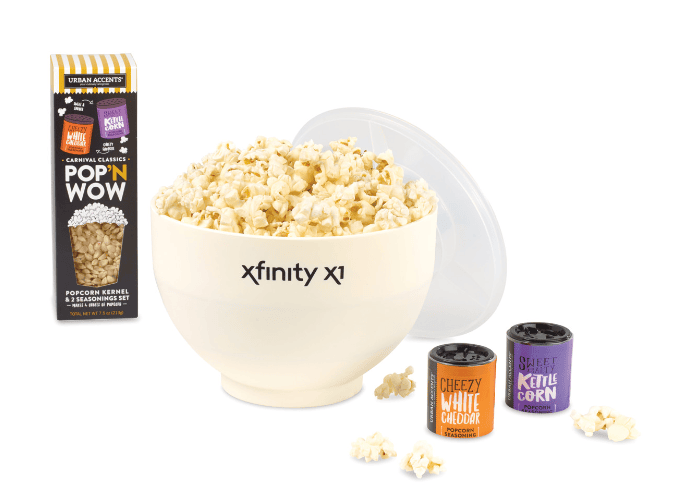 Screenshot of a bowl of popcorn, a box of popcorn and seasoning.