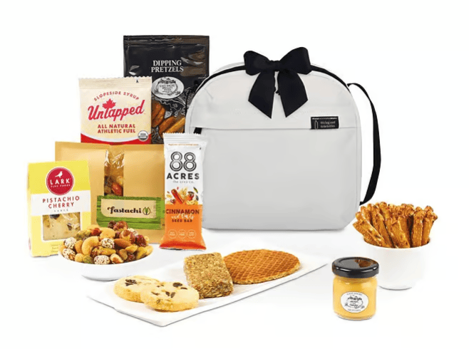 SwagDrop Out To Lunch Gourmet Treats Cooler with assorted snacks, designed for lunch breaks or family enjoyment during the holidays.