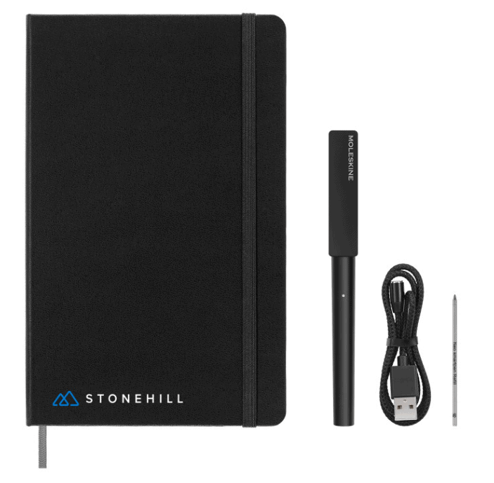 Screenshot of a notebook, a pen, a charging cable and an ink refill.