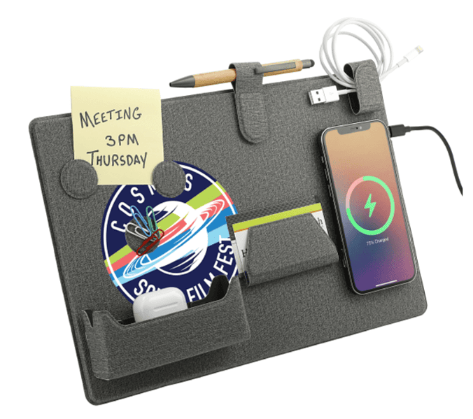 Screenshot of a desk organizer with office supplies and a phone attached.
