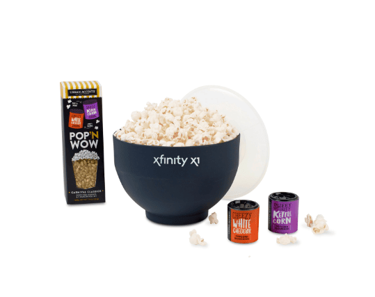 Screenshot of a bowl of popcorn, a popcorn bag and two cans of seasoning.