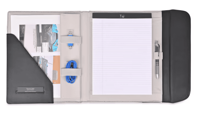 SwagDrop Travis & Wells Lennox Padfolio, in black, combining recycled nylon and vegan leather in a slim profile with built-in organization features.
